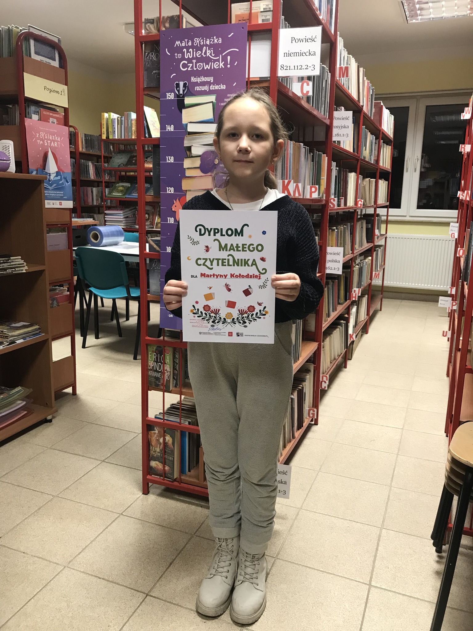 Nowa czytelniczka w bibliotece